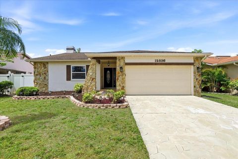 Photo of 12836 Pineway Drive, Largo, FL 33773 (MLS # TB8495414)