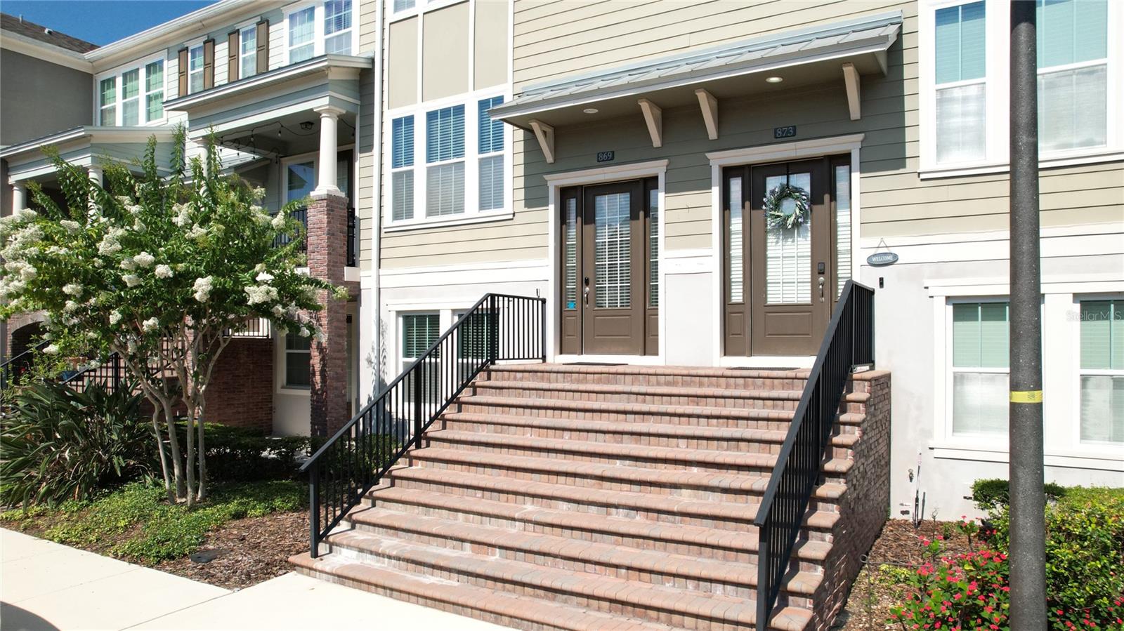 Welcome Home, you will enjoy living in this Three Bedrooom Three- and One-Half Bath Townhome at The Hamptons. Conveniently located near Oviedo on the Park you can walk to shopping and restaurant. Once inside you will love the floor plan with a lower floor that includes a bedroom and bath which ideal as a Home Office or separate Guest Quarters. The large Primary Suite has a beautiful Bathroom and a Large Walk-In Closet. Entertain in the Great Room with its granite and marble Accent Walls and Stainless-Steel Appliances