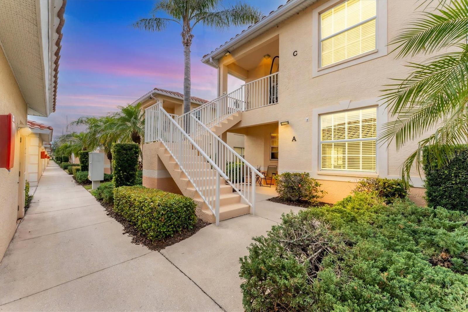 Outstanding location in the beautiful gated community of Venetia. Maintenance free living this spacious top floor end unit condo features 3 bedrooms, 2 bathrooms and a single car garage.The split floor plan offers plenty of privacy. Master bedroom with large master bath and double sink vanity and great closet space. Tranquil views of the lake from the living room and your private screened lanai. Venetia offers 2 community pools, hot tub, tennis courts, Clubhouse and Recreational facilities. Venetia is located near shopping, beaches, golf & restaurants.Enjoy peaceful sunset views of the lake with your coffee or wine from the screened-in lanai or join the neighbors at one of two temperature-controlled pools, the clubhouse with a state-of the-art fitness center, hot tub, chair loungers, and tennis, bocce, and pickleball courts. Just a 4 mile bike ride to the gulf beaches and a 15 minute drive to historic downtown Venice with local boutiques, restaurants, and plenty of ice cream and breathtaking sunsets.elcome to Casa Di Amici, nestled within this desirable active community lies a stunning 3 bedroom, 2 bathroom, second floor offering the perfect blend of comfort and style. As you step inside, you're greeted by an inviting OPEN, SPLIT floor plan, ideal for entertaining guests or relaxing with loved ones. The spacious living area flows seamlessly into living room and the lanai, creating a warm and welcoming atmosphere. Let the nature surround you with this view! Prepare to be captivated by the picturesque views from the screened-in balcony, where you can savor your morning coffee or unwind with a glass of wine. This condominium is not only a haven for relaxation but also a hub for recreation. Residents of Casa Di Amici enjoy access to a range of amenities, including a state-of-the-art fitness center, a large heated pool perfect for swimming laps or lounging in the sun, and tennis courts for those seeking an active lifestyle. Conveniently located you'll have easy access to an array of dining, shopping, and entertainment options. Whether you're strolling along Venice Beach, exploring the local boutiques, or enjoying a round of golf at one of the nearby courses, there's always something exciting to do just moments from your doorstep. Don't miss out on this opportunity to experience luxury living at its finest in Casa Di Amici.