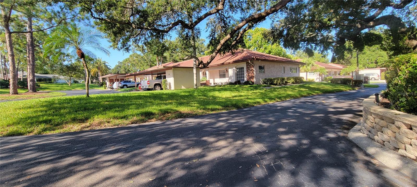Scotsdale Villa Condos – Your Ideal Florida Retreat. Welcome to Scotsdale Villa Condos, a serene 55+ community that feels like a resort. Tucked among mature trees and beautifully maintained landscaping, this rehabbed end-unit villa offers a sense of relaxation and comfort from the moment you arrive.
This unit features new kitchen, flooring and fresh paint. This bright and airy 2-bedroom, 2-bath home features an open floor plan designed for easy living. The fully equipped kitchen includes a convenient passthrough to the dining and living areas, perfect for entertaining guests. The spacious primary suite offers a private escape, complete with a full bath and a walk-in closet. A generously sized second bedroom—also with a walk-in closet—is ideal for guests or hobbies, with a second full bathroom located just down the hall.
Enjoy year-round comfort in the enclosed patio, which includes a utility closet with a full-size washer and dryer, plus additional storage space. The villa also comes with a private storage room and a covered parking spot just steps from your front door, along with plenty of guest parking nearby.
Low HOA fees grant you access to fantastic amenities, including a swimming pool, tennis and pickleball courts, a recreation center, and scenic lake views. Located in a non-flood zone, Scotsdale Villas is just minutes from charming Downtown Dunedin, shopping, dining, entertainment, and the pristine beaches of Honeymoon Island State Park.
This property is being sold As Is and is attractively priced for a quick sale. Schedule your showing today and start living the resort lifestyle you deserve!