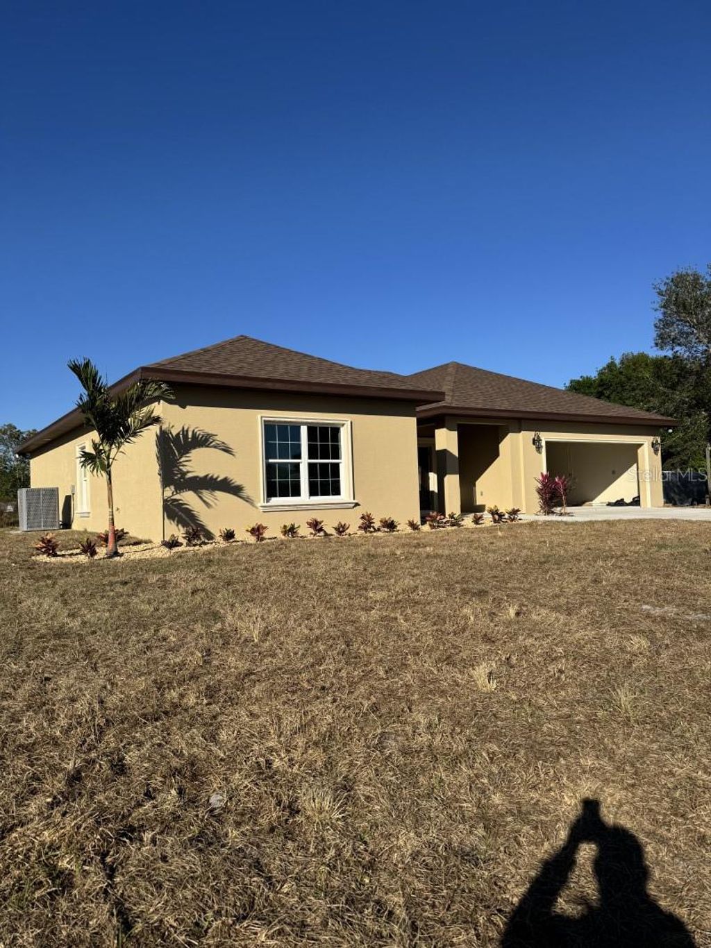Photo of 8351 SW 14th Lane, Okeechobee, FL 34974 (MLS # A4680207)
