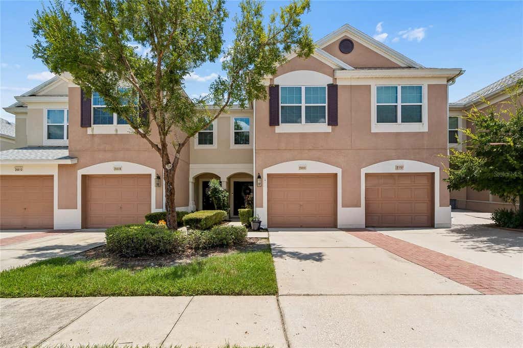 Photo of 26606 Castleview Way, Wesley Chapel, FL 33544 (MLS # TB8527027)