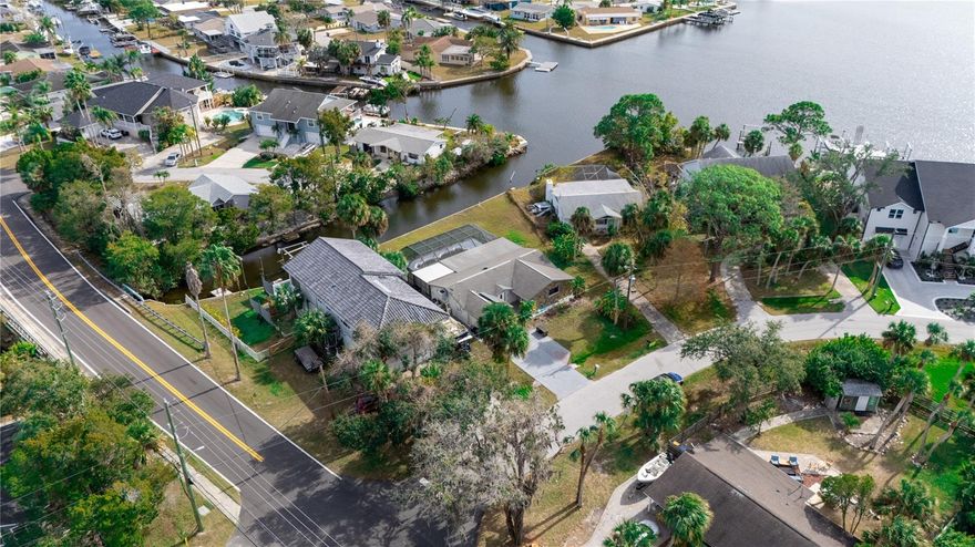 Modern, fully remodeled waterfront home on Miller Bayou offering stunning views, luxury finishes, and a true coastal-living experience. Located at 5254 Miller Bayou Dr, Port Richey, FL 34668, this 3-bedroom, 3-bath property has been completely updated inside and out with high-end contemporary design.
Key Features
- Premier waterfront location with direct bayou views and gorgeous sunsets 
- Fully renovated: new interior/exterior paint, lighting, fixtures, tile, bathrooms, and more 
- Modern chef’s kitchen with new cabinets, stainless steel appliances, granite counters, and backsplash 
- Open-concept layout with abundant natural light and French doors leading to the pool and water 
- Luxurious primary suite featuring two walk-in closets and a brand-new spa-style bathroom 
- Oversized guest bedrooms with updated finishes 
- Screened-in pool and covered lanai overlooking the water—ideal for entertaining 
- Special cement coating on pool deck, driveway, and walkways 
- Newer roof and fully updated mechanicals 
- Professionally landscaped yard with tropical feel and space for boat/RV storage 
- Walk or golf-cart to restaurants, parks, shops, public docks, and the private neighborhood beach 
- Minutes to the Gulf of Mexico 
This home shows exceptional pride of ownership and lives like a brand-new modern waterfront retreat. Furnishings may be available as they complement the space beautifully.