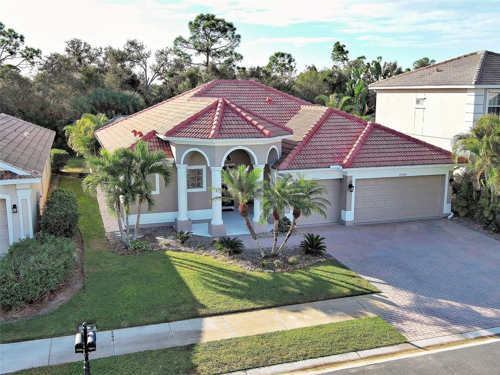 Photo of 11934 Granite Woods Loop, Venice, FL 34292 (MLS # N6141340)