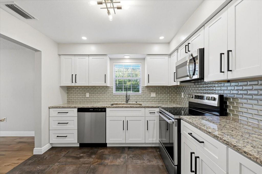 Photo of 1706 Belleair Forest Drive #128, Belleair, FL 33756 (MLS # TB8473980)