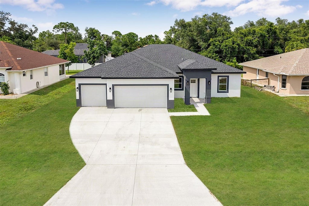 Photo of 8274 Mossborger Avenue, North Port, FL 34287 (MLS # O6433286)