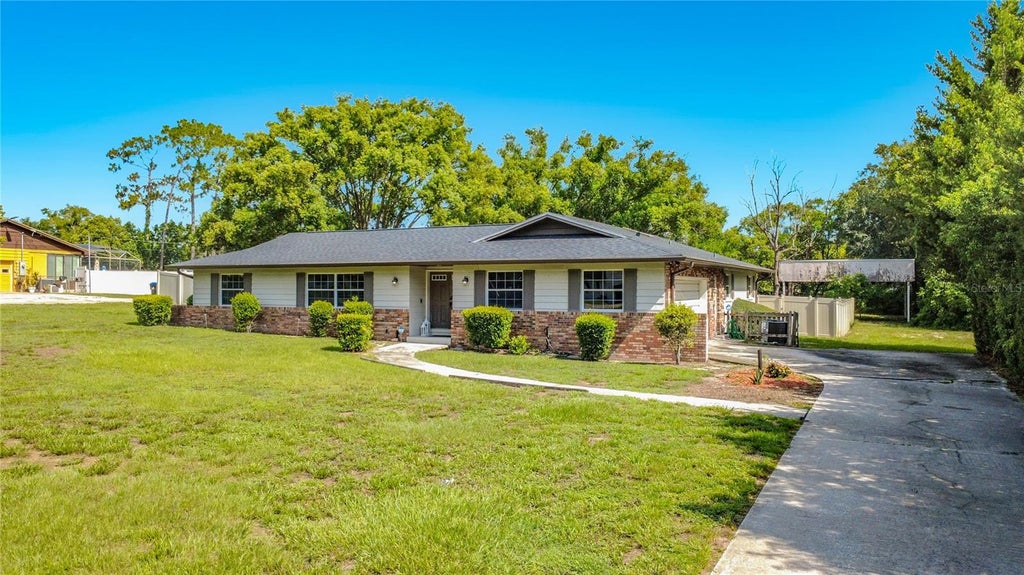 Photo of 6313 Wynglow Lane, Orlando, FL 32818 (MLS # O6432211)