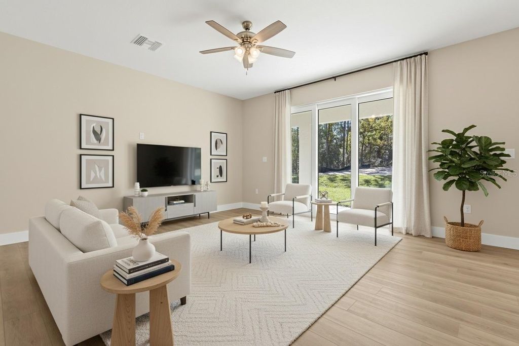 Photo of 13040 Tinamou Avenue, Weeki Wachee, FL 34614 (MLS # TB8448998)