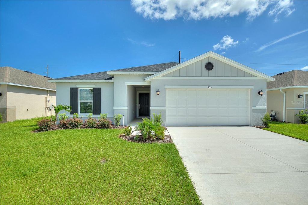 Photo of 305 Summer Grove Way, Haines City, FL 33844 (MLS # O6361310)