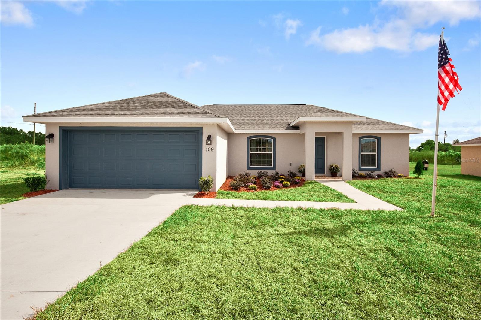 Under Construction. Builder to pay buyer's closing costs up to $15,000 with closing within 45 days. Builder also offering 4.99% , 30 YEAR FIXED rate, closing within 45 days.* Call agent for further details. **Not including escrows.** Additionally, Builder is offering a washer / dryer if buyer goes under contract within 72 hours of 1st showing. This award-winning, new construction 3 bedroom/2 bath home features cathedral ceilings in both the living room and kitchen. The master bedroom suite offers a walk-in closet as well as granite countertop and tiled master walk-in shower in the bath. Granite counters and beautiful wood cabinetry are featured in both the guest bath as well as the kitchen. The 8 ft kitchen counter is perfect for family dining or step through your kitchen French doors and dine in the screened-in lanai! Stainless appliances, upgraded lighting fixtures, Luxury Vinyl Planking flooring throughout and finished two car garage come standard. Builder provides 2-10 Home Buyer’s Warranty. **Photos depicted are of model home. Interior and Exterior colors as well as Left/Right orientation may vary. Photos are for illustration purposes only. This home is NOT in an HOA neighborhood.