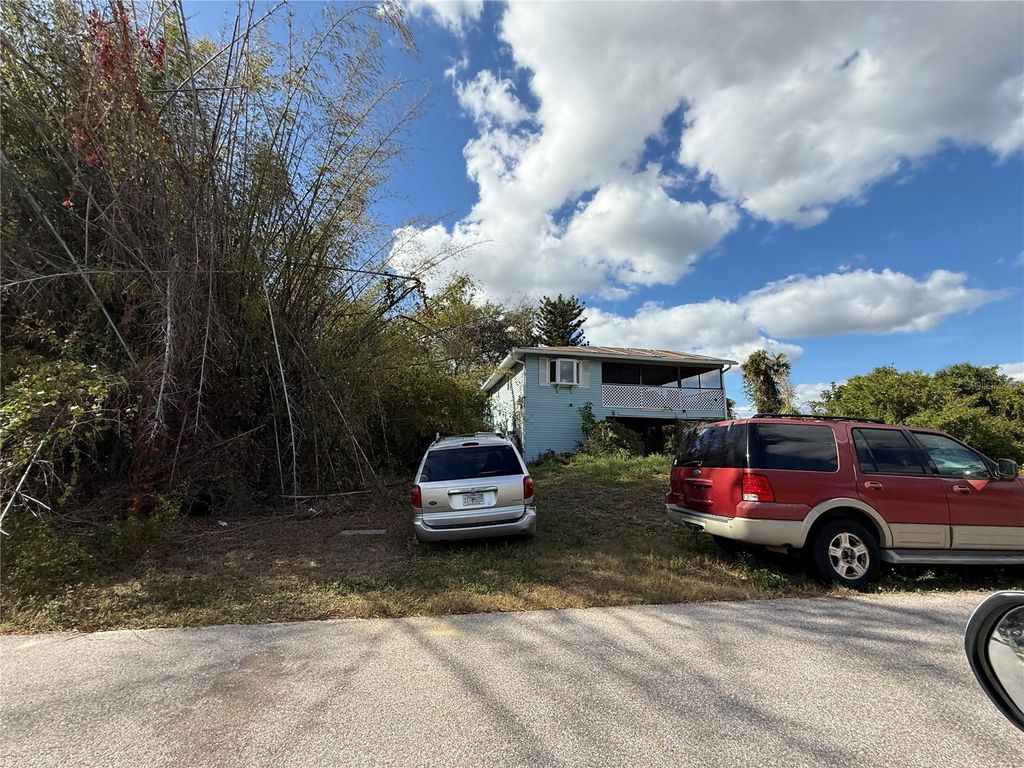 Photo of 2027 Midnight Street, Port Charlotte, FL 33948 (MLS # C7519325)