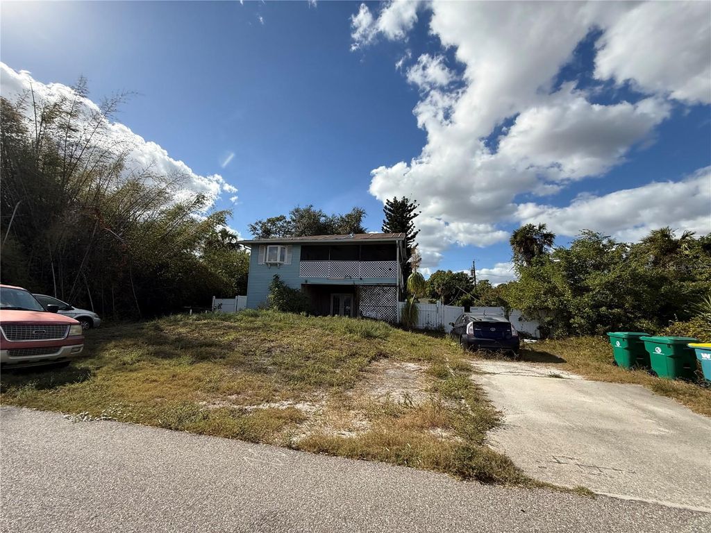 Photo of 2027 Midnight Street, Port Charlotte, FL 33948 (MLS # C7519325)