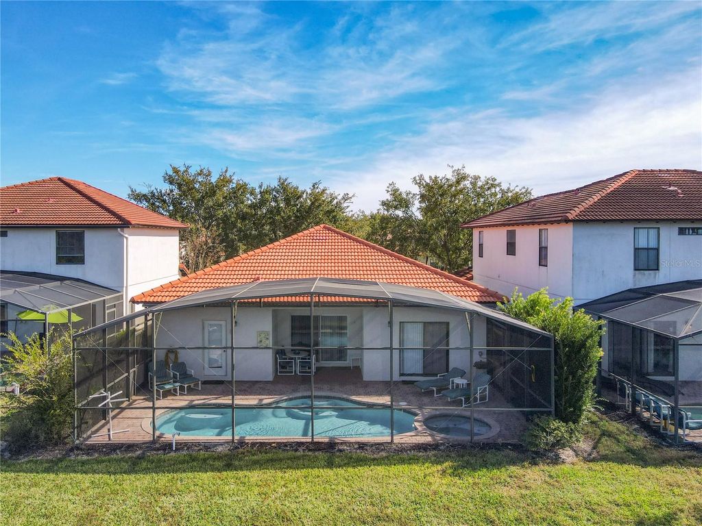 Photo of 16658 Lazy Breeze Loop, Clermont, FL 34714 (MLS # O6360322)