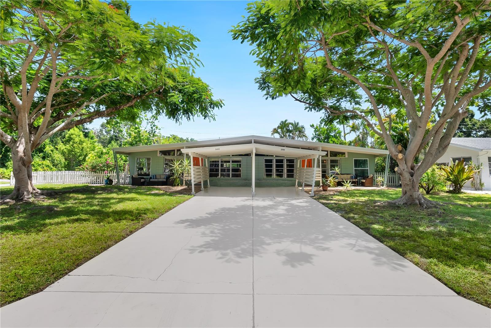 An updated jewel in the heart of Sarasota's historic South Gate neighborhood, this recently renovated and furnished bright home stands as a testament to the mid-century boom that shaped Sarasota. With two bedrooms, one bath and a separate enclosed sunroom/office with sliding glass doors should you need quiet while working, it has it all. Sunroom square footage not included in square footage under air. Lots of windows and skylights allow for natural light to pour inside. Three parking spots, privately fenced backyard and interior laundry room are all wonderful features. Positioned ideally, the location boasts more than just the city's dynamic arts scene, delectable eateries and beaches. Arlington Park is across Tuttle with public pool, tennis courts, basketball courts, playground, recreational facilities and large park with fountain.