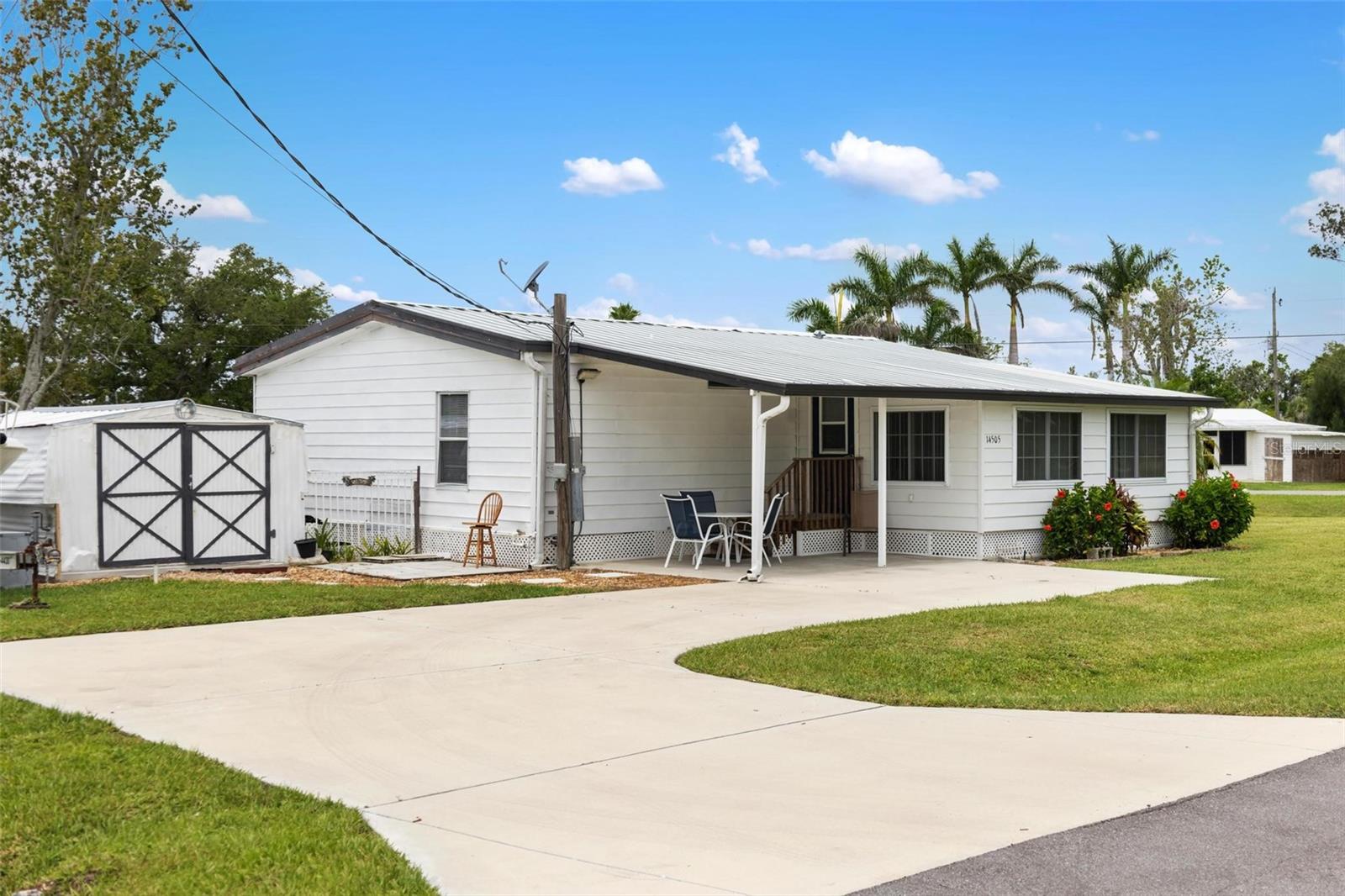 Welcome to your Florida retreat in charming El Jobean! This nicely maintained 2-bedroom, 2-bath mobile home sits on an oversized lot with no deed restrictions – perfect for those who want freedom and space. Whether you're looking for a winter getaway or full-time residence, this property offers plenty of room to park your boat or RV, and it's just minutes from a public boat ramp, making it a dream location for boating and fishing enthusiasts.
Inside, you’ll find lovely new flooring throughout, giving the home a fresh, clean feel. While the kitchen and bathroom cabinets will need replacement due to water damage from the 2024 hurricanes, this gives you the perfect opportunity to customize and make it your own.
El Jobean is a quiet, laid-back waterfront community nestled between Port Charlotte and Englewood, known for its Old Florida charm, easy access to the Myakka River, and quick drive to Gulf beaches, shopping, and dining. With no HOA and no strict rules, you're free to live how you want.
Don't miss this opportunity to own a piece of paradise with endless potential and room to grow in one of southwest Florida's hidden gems!