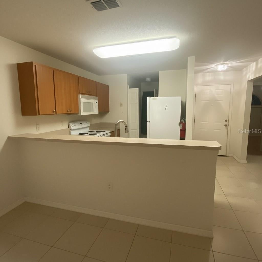 Photo of 2150 Mystic Ring Loop, Kissimmee, FL 34759 (MLS # TB8516580)