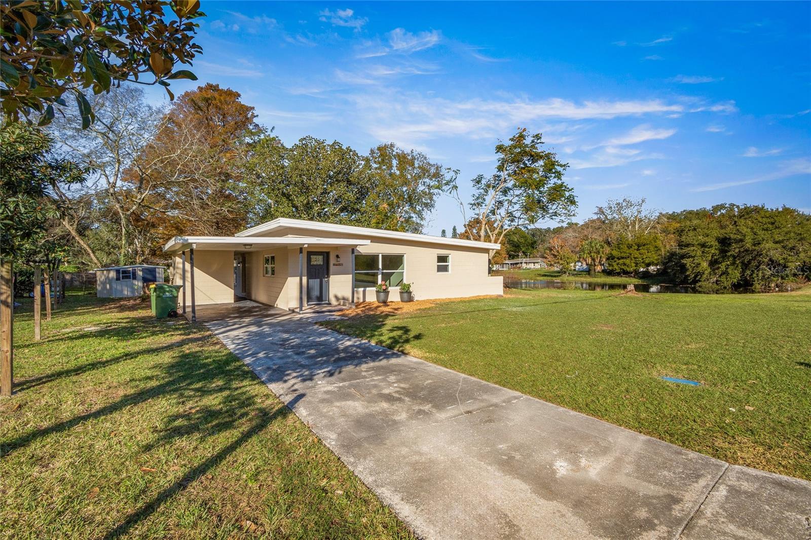 Renovated to include NEW ROOF, NEW HVAC, new water heater, new luxury vinyl plank flooring, new kitchen cabinets and granite counter tops, new Stainless steel appliances and new interior and exterior paint, NO HOA and beautiful lake views. This delightful 3-bedroom, 1-bathroom is the perfect blend of comfort, style, and convenience. Step inside to discover a beautifully transformed interior. The open floor plan creates a seamless flow between spaces with an abundance of natural light. Conveniently located in Leesburg, FL, this home is situated in a serene neighborhood that offers a perfect balance of tranquility and accessibility. Enjoy proximity to local amenities, parks, schools, and more, providing a wonderful lifestyle for residents. Don't miss the chance to make this beautifully updated residence your own. Schedule a viewing today and envision the possibilities awaiting you in this stunning home!