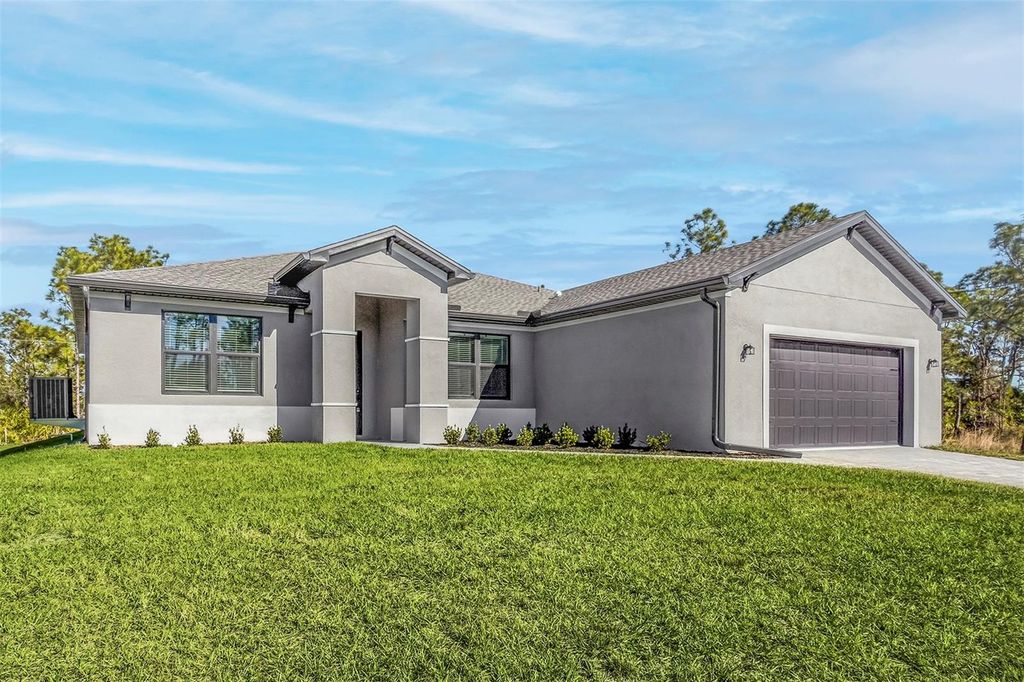Photo of 12152 Snow Bird Avenue, Port Charlotte, FL 33981 (MLS # TB8316571)