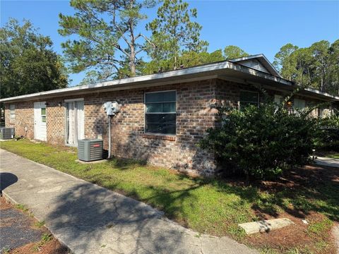 Photo of 5811 NW 23rd Terrace #A, B, C, D, Gainesville, FL 32653 (MLS # GC535112)
