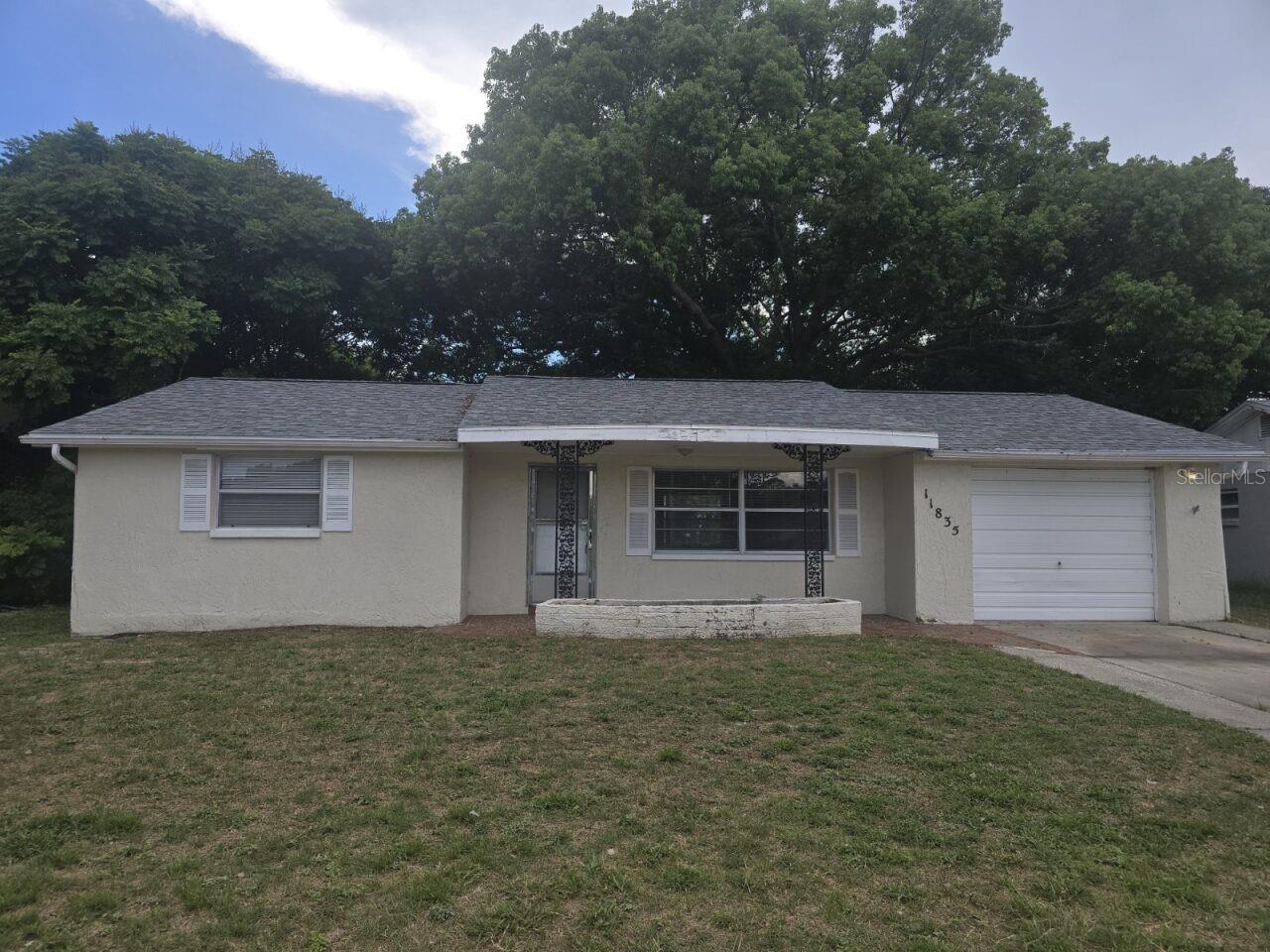 Freshly painted 3-bedroom/1.5 Bath home for rent in Port Richey! New carpets in the bedrooms as well. Large living/dining area and huge fenced in backyard. Enjoy the large patio with huge shade tree out back. Home is only minutes from shopping, restaurants, parks and beaches. Looking for an annual lease. Pets are accepted with size and breed restrictions.