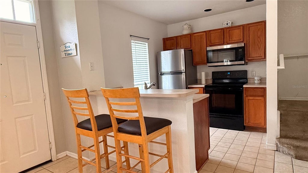 Photo of 2205 San Vittorino Circle #102, Kissimmee, FL 34741 (MLS # S5158518)