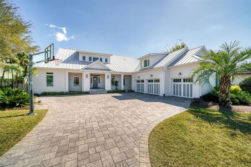 Welcome to your DREAM LAKEFRONT LIVING in College Park! This Stunning Newer Home offers 5 bedrooms, 6 baths, over 5,000 sq. ft. and PANORAMIC WATER VIEWS. Enjoy Spacious Living Areas, a Gourmet Kitchen with High-end appliances, and a Luxurious Downstairs Master Suite. Plenty of upstairs space with a Loft and a HUGE Bonus Room for added entertainment! Entertain guests in the Backyard Oasis with a Sparkling Swimming Pool and Private Dock with Breathtaking Sunsets. Edgewater Drive Shopping, Dining, and Entertainment just blocks away!!! Don't miss this opportunity for luxury lakeside living in the heart of Central Orlando!!!