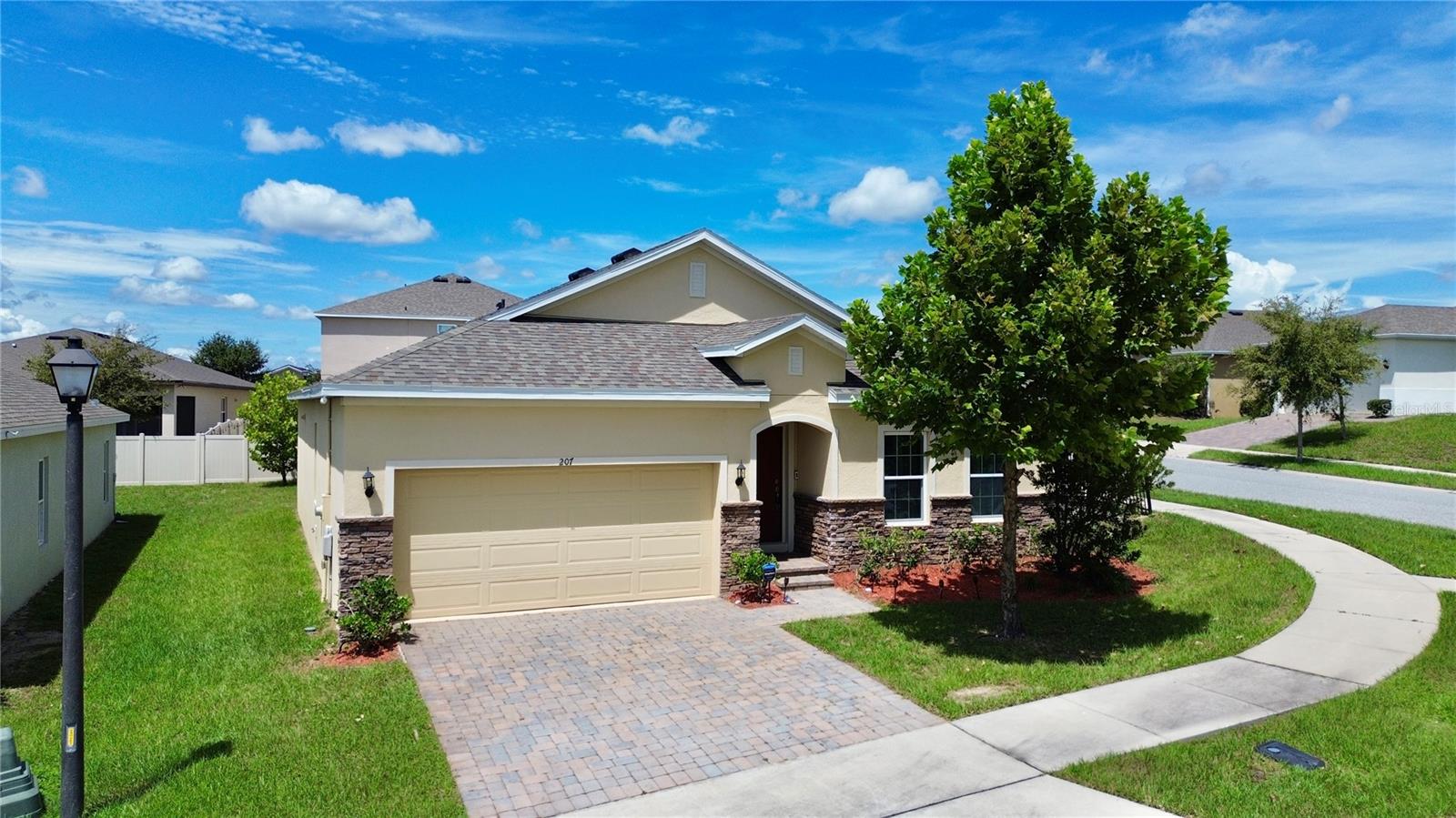 Welcome to this inviting 4-bedroom, 2-bath ranch-style home located in the highly desirable Preserve at Sunrise community. Perfectly positioned on a corner lot, this residence offers an open-concept design with modern upgrades and versatile living spaces, making it ideal for both relaxation and entertaining.
Step inside to an open-concept floor plan with tile flooring throughout the main living areas. A bonus room provides the flexibility you need—whether as a home office, playroom, or additional living space to suit your lifestyle.
The kitchen is a true highlight, featuring quartz countertops, 42" wood cabinets, and stainless steel appliances—ideal for everyday cooking and entertaining. The spacious primary suite offers a peaceful retreat with a walk-in closet. The primary bath features dual sinks, tile flooring, and a glass-enclosed walk-in shower with a rain shower head / digital thermostat for the perfect water temperature every time.
Enjoy Florida’s indoor-outdoor lifestyle on the covered lanai, perfect for morning coffee or evening gatherings year-round.
Residents of Preserve at Sunrise enjoy fantastic amenities, including a resort-style pool, multiple playgrounds, scenic parks, and a private fishing dock with direct access to Lake Lucy—perfect for kayaking, fishing, or evening walks along the water.
Located in Groveland, one of Central Florida’s hidden gems, you’ll love the small-town charm, rolling hills, local events, and farmers markets—all while being just minutes from major highways, hospitals, shopping, and Orlando’s world-class theme parks.
This home truly offers the best of Florida living—schedule your private showing today!