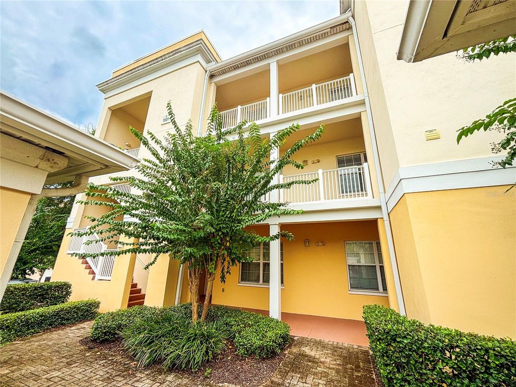 Photo of 1501 Northern Harrier Way #101, Reunion, FL 34747 (MLS # O6368665)
