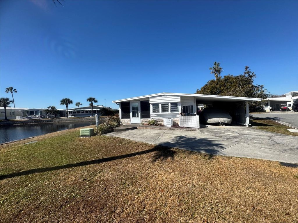 Photo of 4842 Britni Way #058, Zephyrhills, FL 33541 (MLS # TB8473518)