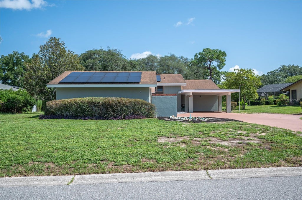 Photo of 109 Arrowhead Lane, Haines City, FL 33844 (MLS # TB8531730)