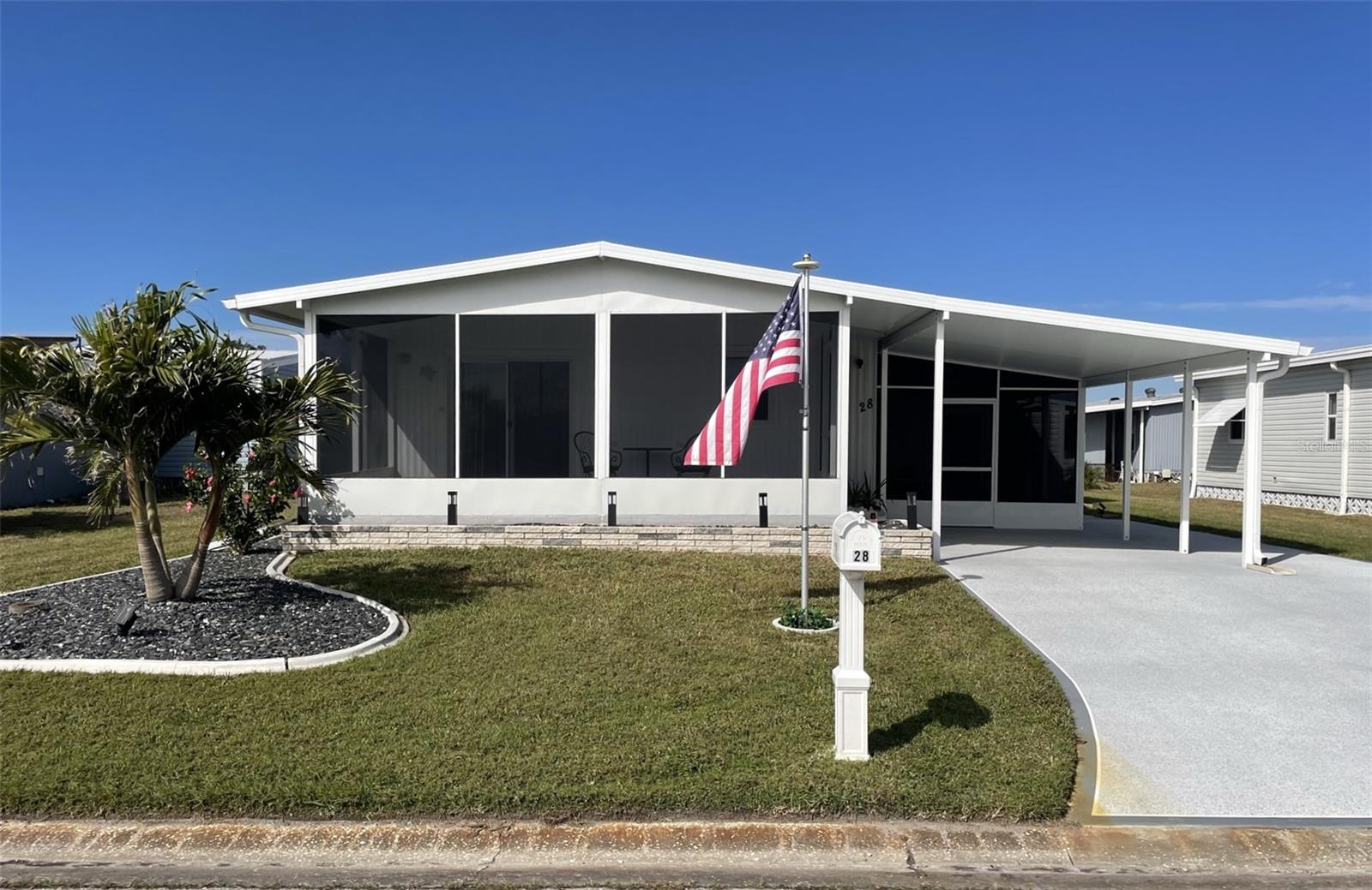 Experience the Florida lifestyle in this beautifully updated 2-bedroom, 2-bathroom manufactured home located in the highly desirable Harbor Isles community. This open-concept gem features a newly remodeled kitchen with stunning dove grey solid wood cabinets, granite countertops, and brand-new stainless steel appliances. An oversized sink and abundant counter space make it a dream for cooking and entertaining.
The living areas boast new luxury vinyl flooring, adding modern style and durability. The guest room includes a convenient stacked washer and dryer. A metal roof and a new carport, along with a 2-year-old AC, ductwork and hot water heater, ensures peace of mind for years to come.
Enjoy outdoor living with a new screened Florida room at the front, a charming screened lanai on the side, and a spacious new 19x13 shed for all your storage needs. An additional concrete pad along the driveway provides ample space for your golf cart.
This home is being sold turnkey furnished, ready for you to move in and start enjoying the amenities and lifestyle Harbor Isles has to offer.
Situated along the picturesque Myakka River, Harbor Isles is a vibrant, pet-friendly, 55+ community known for its resort-style amenities and active lifestyle. Residents have access to a marina with Gulf access, a heated pool, spa, fitness center, clubhouse, tennis and pickleball courts, shuffleboard, and bocce. The community also offers a variety of social activities and clubs, fostering a sense of connection and belonging. Conveniently located near shopping, dining, golf courses, and the stunning beaches of Florida's Gulf Coast, Harbor Isles provides everything you need to live your best life.
Don’t miss this incredible opportunity!