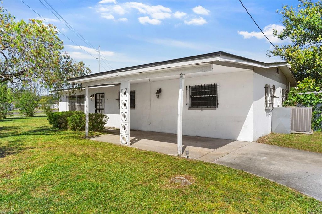 Photo of 815 Papaya Drive, Tampa, FL 33619 (MLS # C7522149)