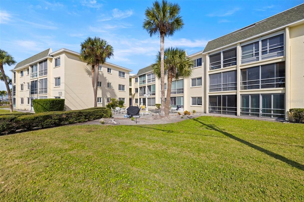 Photo of 6767 Sunset Way #206, St Pete Beach, FL 33706 (MLS # TB8461605)