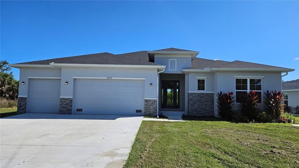 Photo of 9370 Snapper Circle, Port Charlotte, FL 33981 (MLS # L4956058)