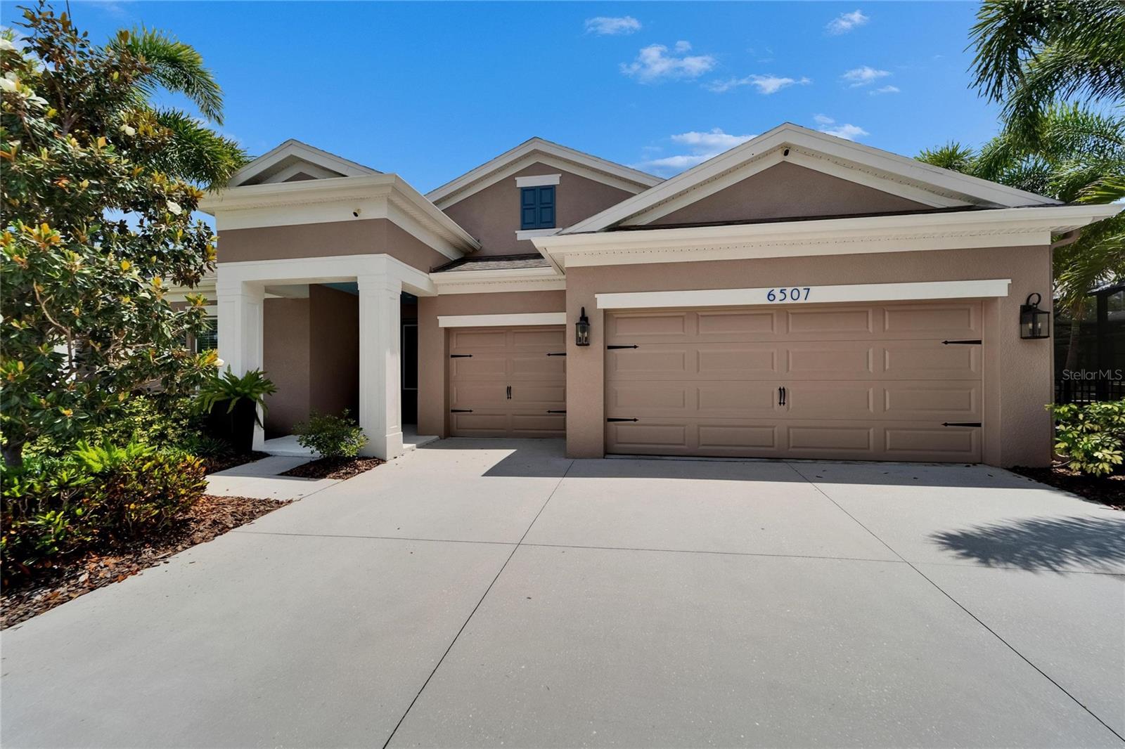 Seller offering $5,000 in closing concessions! Stunning BAYSHORE I floorplan by Homes of West Bay on a prime deep lot with no rear neighbors. Move-in ready with high ceilings, wide hallways, upgraded tile, arched doorways, and a 16’ sliding glass door for seamless indoor-outdoor living. The gourmet kitchen features a huge island, granite counters, 21 staggered cabinets with crown, 6-burner gas range, convection oven, walk-in pantry with wood shelving, and upgraded appliances. Owner’s suite offers 2 walk-in closets, linen closet, full cabinets, and a spa-like bath. Split plan includes 3 additional guest bedrooms and 2 more full baths. OUTSIDE Enjoy a 34’ x 12’ screened lanai with gas hookup, fully fenced backyard, and lush landscaping. Extended 3-car garage with pull-down attic stairs and extra-wide driveway. Smart-home features include security system, upgraded HVAC with humidistat, and remote thermostat. Located in sought-after Waterset, with resort-style amenities: 12+ miles of trails, lakes, pools with slides, fitness centers, parks, and sports courts. Easy access to US 41, 301, I-75, Selmon Expwy, Downtown Tampa, MacDill AFB, Sarasota, shopping, and dining.