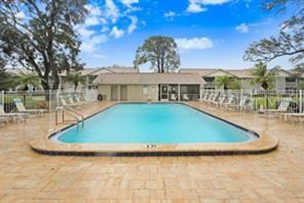 Photo of 1420 Oak Hill Drive #102, Dunedin, FL 34698 (MLS # TB8426643)