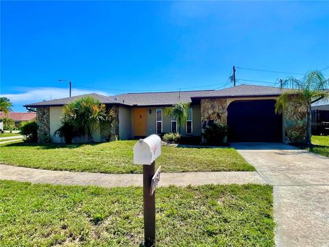 Photo of 1037 Tamarac Drive, Holiday, FL 34690 (MLS # TB8413647)