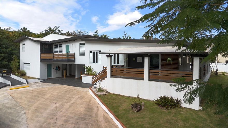 This stunning residence immediately captivates with its sense of scale, comfort, and versatility, offering a rare opportunity to enjoy refined living while maintaining strong long-term value. The main home features three expansive bedrooms, each with its own private en-suite bathroom, along with a separate studio within the main structure that offers an independent entrance, a full bathroom, and a kitchenette, providing exceptional flexibility for guests, extended family, or private use. A modern open-concept kitchen anchors the home, thoughtfully designed with generous space for all essentials and flowing seamlessly into the main living areas, where abundant natural light enhances the overall ambiance. The spacious living room is ideal for entertaining, relaxing, or gathering with family and friends in a comfortable and inviting setting. The property is located in Valle Verde, Dorado, in an area conveniently close to beaches while still offering the tranquility and green surroundings that define its natural charm.Adding significant value to the property is a detached rear casita that conveys with the sale, offering the future owner the opportunity to complete and customize it entirely to their personal taste. This additional structure allows for multiple possibilities, including a private guest house, independent living quarters for extended family, or an additional income-producing unit. The main residence is currently active in the short-term rental market and generates strong income, making this property especially attractive for buyers seeking flexibility, whether to live in the home for part of the year while renting it during other months, reside in the main house while renting the rear casita once completed, or fully maximize the property’s investment potential.The property sits on an expansive lot of approximately 2,047.52 square meters, offering privacy, space, and a strong sense of openness. It also features a beautifully renovated swimming pool, creating a private retreat ideal for enjoying the tropical climate without leaving home. For added peace of mind, the residence is fully fenced and equipped with a full power generator that services the entire property, ensuring uninterrupted electricity during outages, along with a water reserve system that guarantees continuity of service. With approximately 4,900 square feet of gross living area plus an additional 300 square feet of terraces and balconies, this exceptional property delivers generous proportions, flexibility, and lifestyle appeal, making it a compelling offering in today’s market.