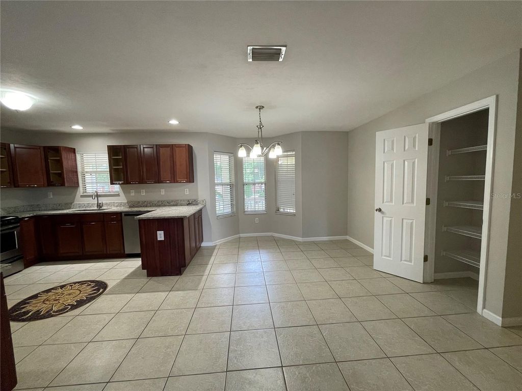 Photo of 717 NW 233rd Terrace, Newberry, FL 32669 (MLS # GC539317)