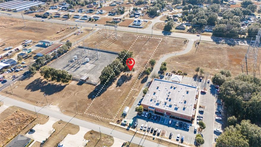 Beautiful commercial lot located in the heart of silver spring shores close to McDonald and publix, a growing 
area, where you can develop your business.