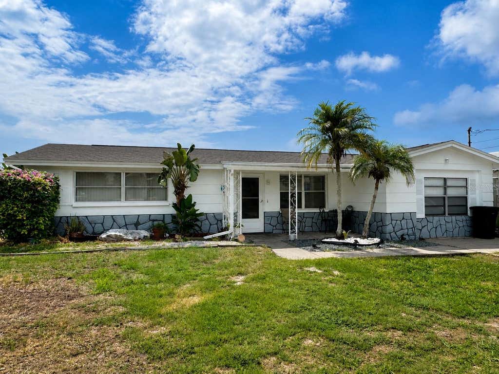 Photo of 1345 Basswood Drive, Holiday, FL 34690 (MLS # TB8533703)