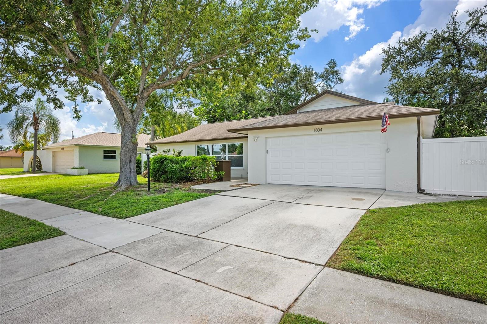 BEAUTIFULLY UNDATED 4 BEDROOM 2 BATHROOM PLUS DEN HOME LOCATED IN THE HIGHLY SOUGHT AFTER TAMAROM COMMUNITY!! This home has been completely remodeled and has everything you are looking for. When you walk in you will love how the open floor plan and large windows give this home a light, bright and clean feeling. The kitchen is completely updated and is a chefs dream with tons of cabinet and granite counter top space, updated high-end appliances and looks over the living and dining rooms. The Dining room offers gorgeous built-in cabinetry and counter for extra storage or kitchen supplies and makes for a great work space if needed. Right off the dining room you will find a bonus space that could be used as additional living space or a kids play area and leads out to your large private screened lanai that is the perfect place to sit back and relax while you watch the kids play as the back yard is completely fenced in. The Primary Suite features plenty of space for a king size bed, large walk-in closet and a sliding glass door that leads out to the lanai. The primary bathroom is completely updated with granite counter tops, double vanity sinks and white cabinets along with a walk-in shower. The other bathroom is also completely updated and features a tub and shower combo. The other 3 bedrooms offer plenty of space and nice size closets. All of this is located in the heart of Sarasota. Minutes from the award winning beaches, shopping, restaurants and so much more. Call for your private showing today! This one will not last long!