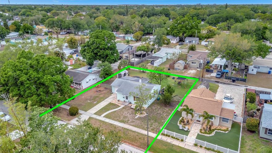 Discover an exceptional opportunity to acquire a generously sized  90 x 110 DOUBLE LOT (9,936 SF) in the desirable Arcadia Subdivision. While the property currently features a 3 bed 1 bath house, the true value lies in the LAND and its developmental potential. The area is experiencing active redevelopment and rising property values. This OVERSIZED Parcel features a BACK ALLEY access, offering added flexibility for design, parking and potential subdivision. With nearly 10,000 of land, this parcel could be subdivided and you could build two new residences. Comparable size lot was recently subdivided and developed into two new construction homes, each selling for approximately $1M. Surrounded by new construction and redevelopment, the property offers a compelling opportunity for builders. Whether you're looking to build your dream home, develop, or hold for future appreciation, this property represents a unique chance to secure land in an appreciating market with proven upside. Fantastic location: 5 minutes from downtown St. Petersburg, shopping, restaurants, recreation, entertainment, and just a short drive to interstates, airports and beautiful Gulf Beaches. Starbucks is across 4th Street. Best and most popular groceries Publix, Whole Foods, Trader Joes and Fresh Market are close. Kayaking at Weedon Park or Coffee Pot Bayou can be part of your daily routine being right in the neighborhood. Also centrally located about 30 mins to Tampa International Airport, with access to everything that the city of Tampa has to offer & 30 mins to Clearwater.