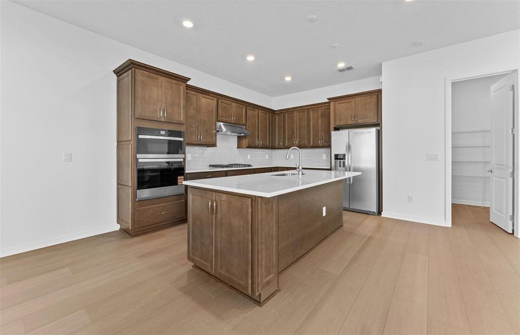 Photo of 6923 Depue Drive, Wesley Chapel, FL 33545 (MLS # TB8434356)