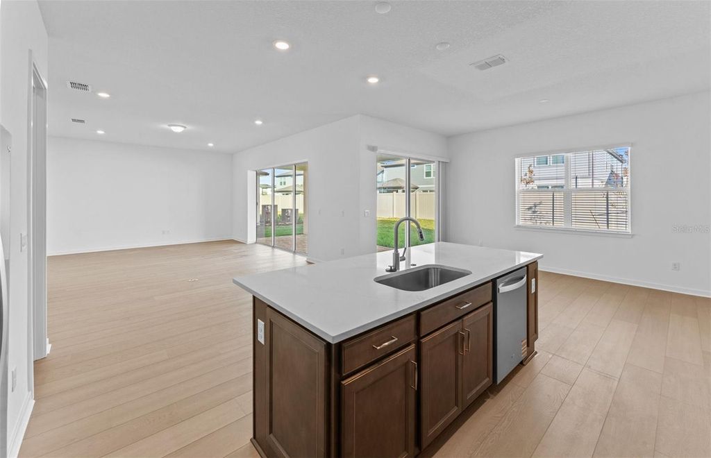 Photo of 6923 Depue Drive, Wesley Chapel, FL 33545 (MLS # TB8434356)