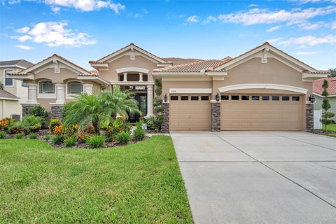 Photo of 11519 Belle Haven Drive, New Port Richey, FL 34654 (MLS # TB8533732)