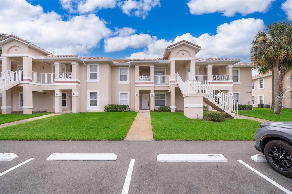 Photo of 13403 Fairway Glen Drive #203, Orlando, FL 32824 (MLS # O6423115)