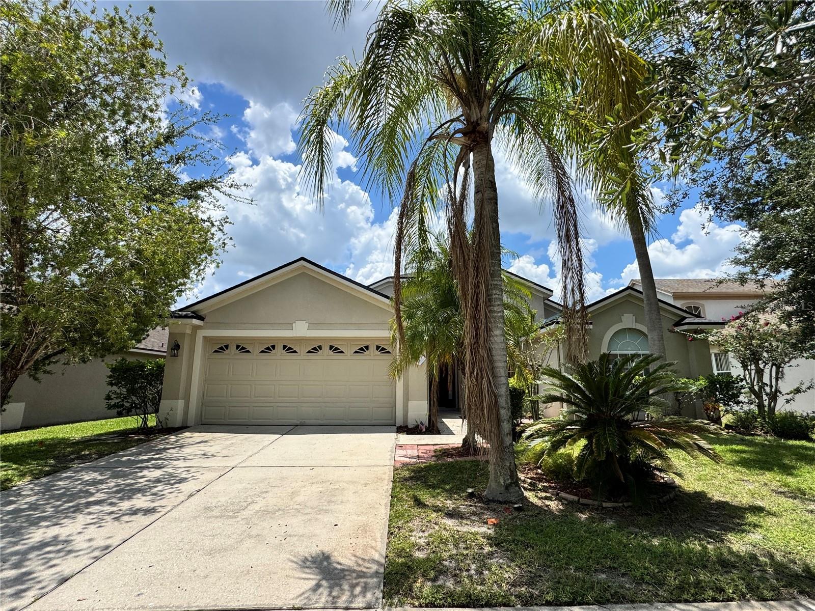Welcome to your private oasis in the desirable Sabal Bend subdivision of Waterford Chase! This beautifully maintained three-bedroom, two-bath POOL home offers the perfect blend of comfort and convenience with a peaceful water view right from your enclosed, screened pool deck—and pool service is included! Inside, enjoy tile flooring throughout the main living areas, soaring high ceilings, and a spacious kitchen/family room combo perfect for relaxing or entertaining. The primary suite is a true retreat featuring a jetted cultured marble soaking tub, dual vanities, a separate shower, and private access to the pool deck. Community amenities include a playground, Tennis Courts, and a Basketball Court. Located just minutes from UCF, Siemens, Lockheed Martin, and major highways 408 & 417, this home is ideally situated for work, play, and everything in between.
