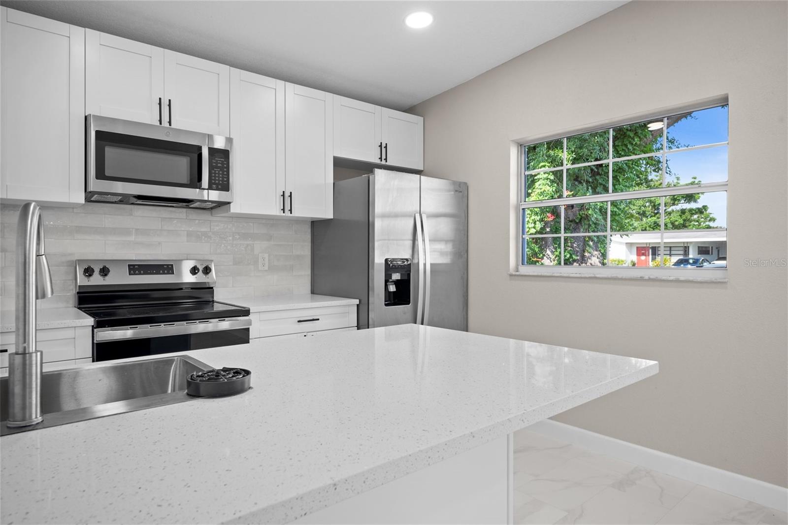 One or more photo(s) has been virtually staged. Spacious & Modern 4-Bedroom, 3-Bath Home in Tampa, Flexible Living, Stylish Updates & Room to Grow
Step into possibility at 6213 N Cameron Ave, Tampa, FL, a beautifully updated 4-bedroom, 3-bathroom home spanning approximately 1,437 square feet, offering a versatile layout and a generous 7,320 square foot lot ready for your vision.
Situated in a well-established neighborhood with easy access to shopping, dining, parks, and major roads, this home blends modern design, functionality, and flexibility in one appealing package.
Inside, you’re welcomed by a bright, open interior finished with sleek tile flooring throughout, filling the home with light and a sense of warmth. The kitchen, designed for both everyday living and entertaining, features stylish stainless steel appliances, clean lines, and ample storage.
Recent improvements give the home a modern look and feel, combining timeless charm with updated finishes that make it move-in ready.
The thoughtful floor plan includes four spacious bedrooms and three full bathrooms, offering both connection and privacy. Two of the bedrooms enjoy side exterior access doors, opening up opportunities for creative uses, whether you envision private spaces for guests, extended family, or dedicated home offices, these rooms add a level of flexibility that’s hard to find.
The expansive 7,320 square foot lot invites you to dream big: imagine adding a pool, creating your own backyard oasis, designing an outdoor entertaining area, or even planning a future expansion, the space is here to bring your ideas to life.
All of this is complemented by practical upgrades like a brand-new roof and new air conditioning system, so you can focus on enjoying your home.
Located just minutes from local parks, playgrounds, dog parks, shopping centers, supermarkets, and restaurants, this Tampa home for sale combines convenience, modern style, and room to grow, offering a flexible canvas to live, host, and thrive.
Discover how this home can fit your vision of life in Tampa.
