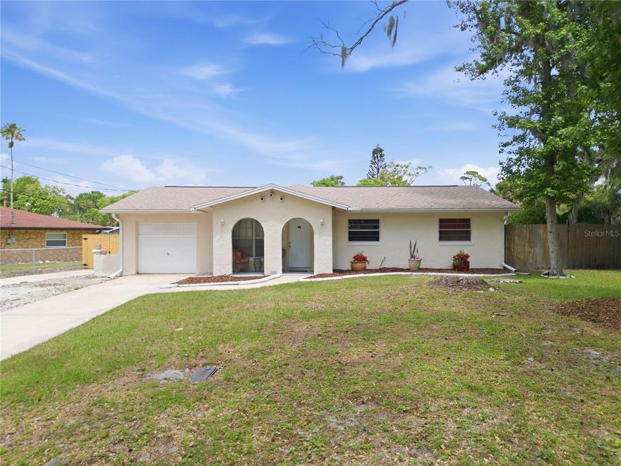 Welcome to this 3 bedroom, 1.5 bathroom home nestled on a spacious corner lot in desirable South Daytona! This property has remained high and dry with NO HISTORY OF FLOODING, offering peace of mind year-round. Recent updates include a brand - NEW ROOF 2023, NEW GAS HOT WATER HEATER 4/2026, NEW STOVE 2025, NEW DISHWASHER 4/2026, NEW REFRIGERATOR 4/2026, giving you a solid head start on the essentials. the home features  a fenced yard, perfect for pets, play or outdoor entertaining. Bring all your toys-- there's an EXTRA LONG DRIVEWAY,with plenty of room for boats, RV's, trailers,or multiple vehicles. With it's great bones and generous lot size, this home is full of potential. Bring your ideas and make it your own!Weather your a first time buyer, investor, or someone looking for a project with an upside, this property is a fantastic opportunity in a convenient location close to shopping, dining and the beach. Don't miss out-- schedule your showing today.